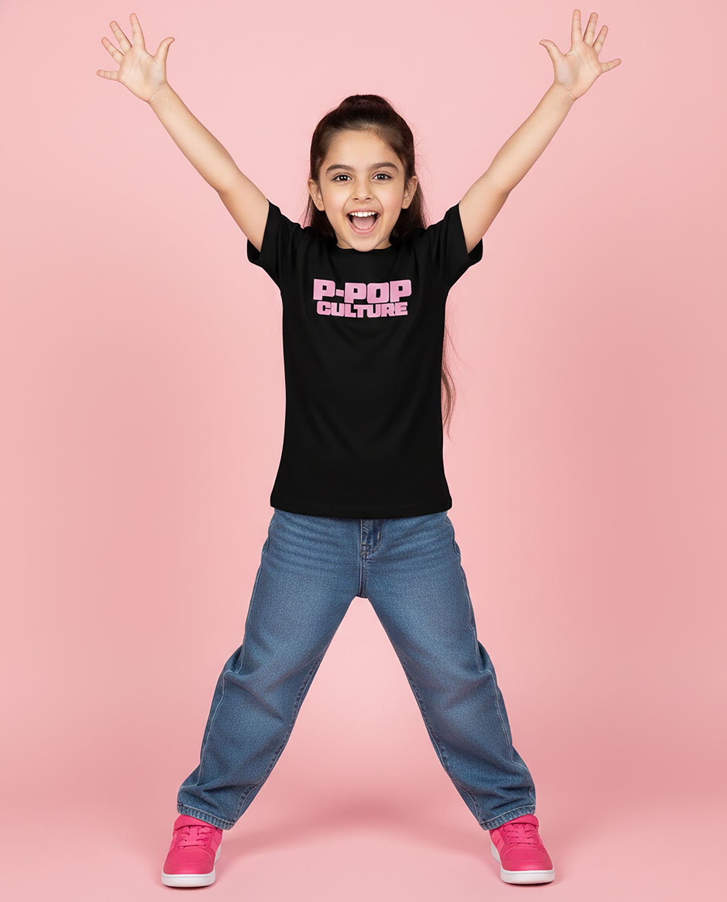 Girl wearing black P-Pop Culture Karan Aujla T-Shirt with pink block print – Garrari Kids Tee