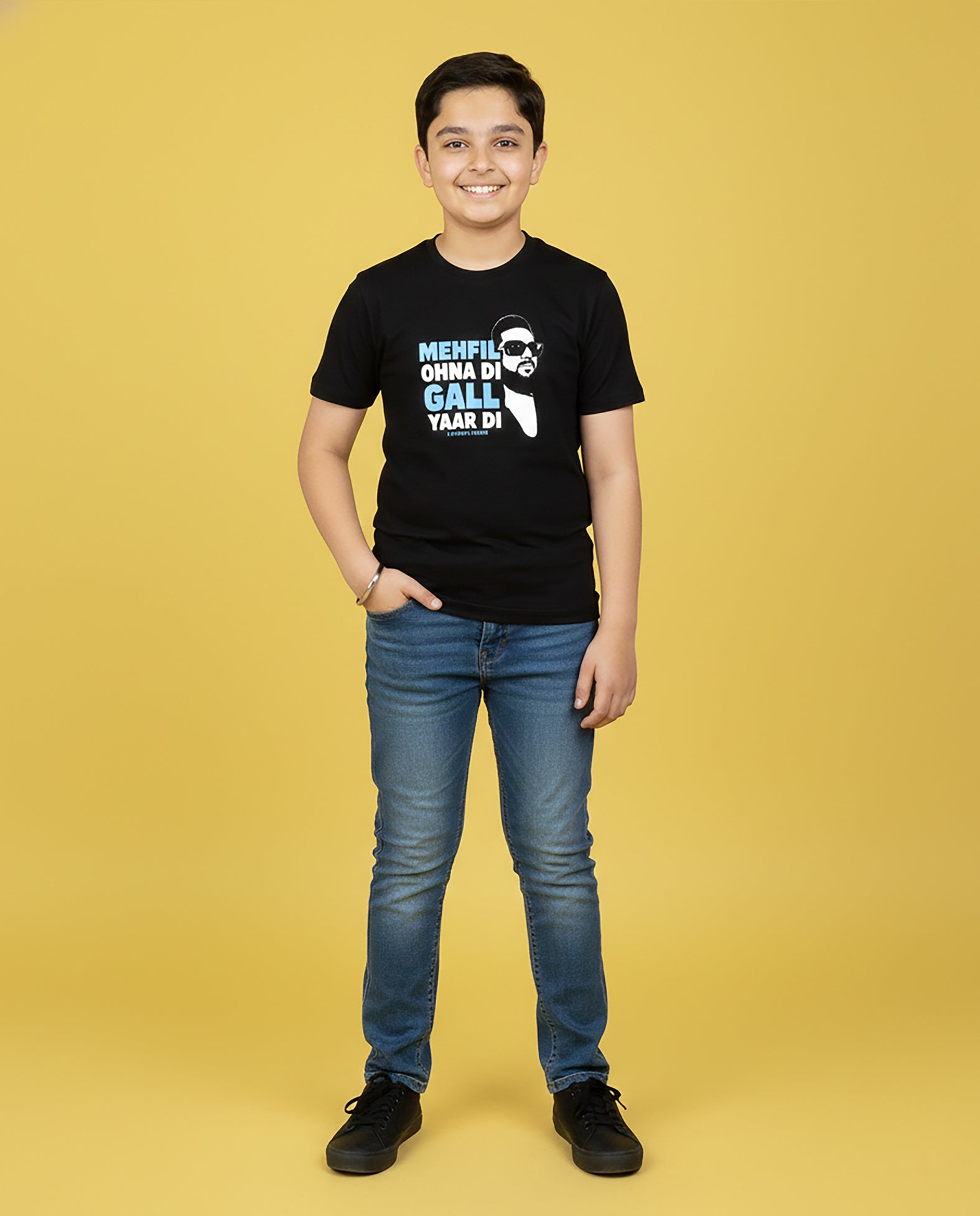 Kid wearing black 7.7 Magnitude Karan Aujla T-Shirt – Unisex Kids Graphic Tee by Garrari