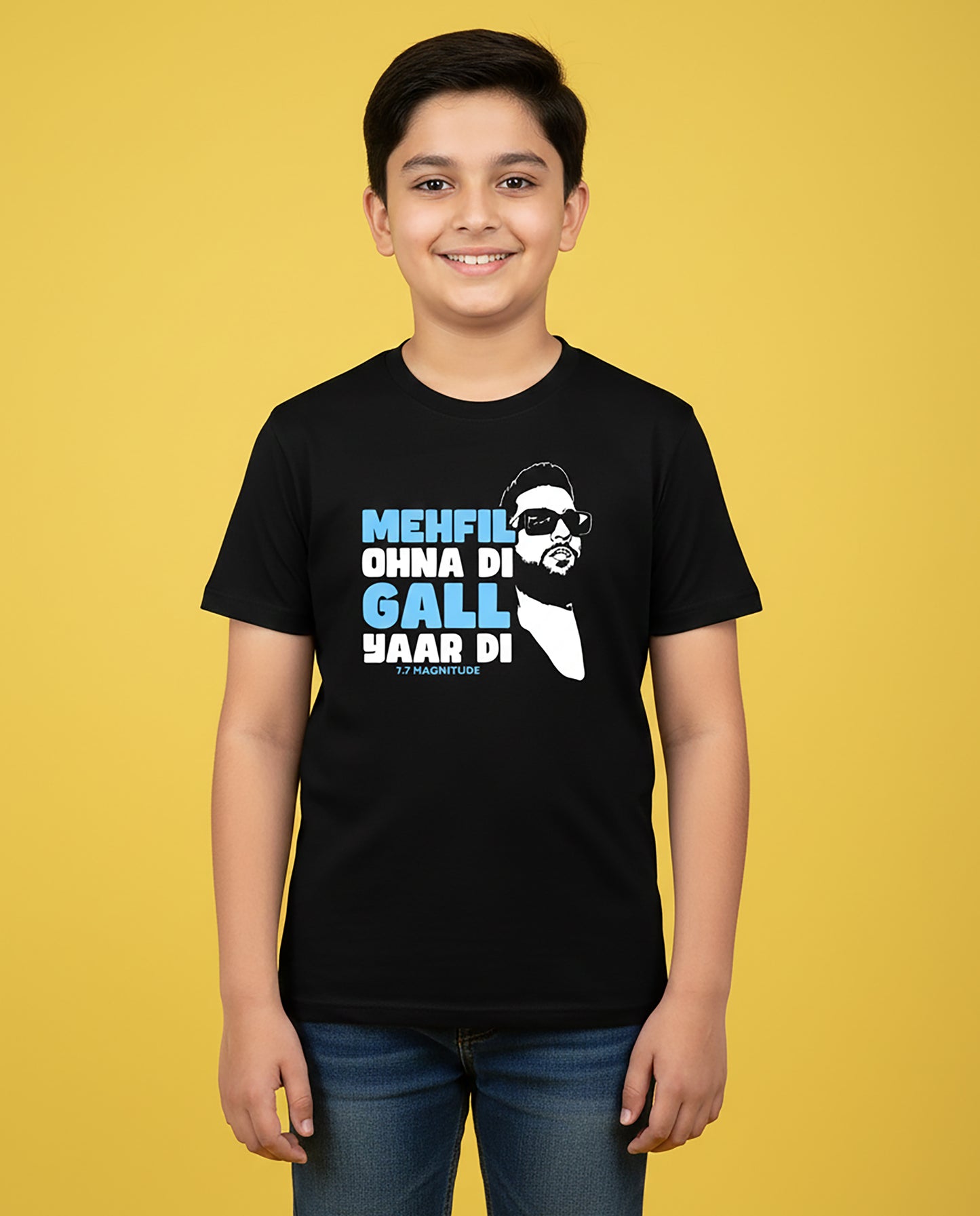 Kid wearing black 7.7 Magnitude Karan Aujla T-Shirt – Unisex Kids Graphic Tee by Garrari