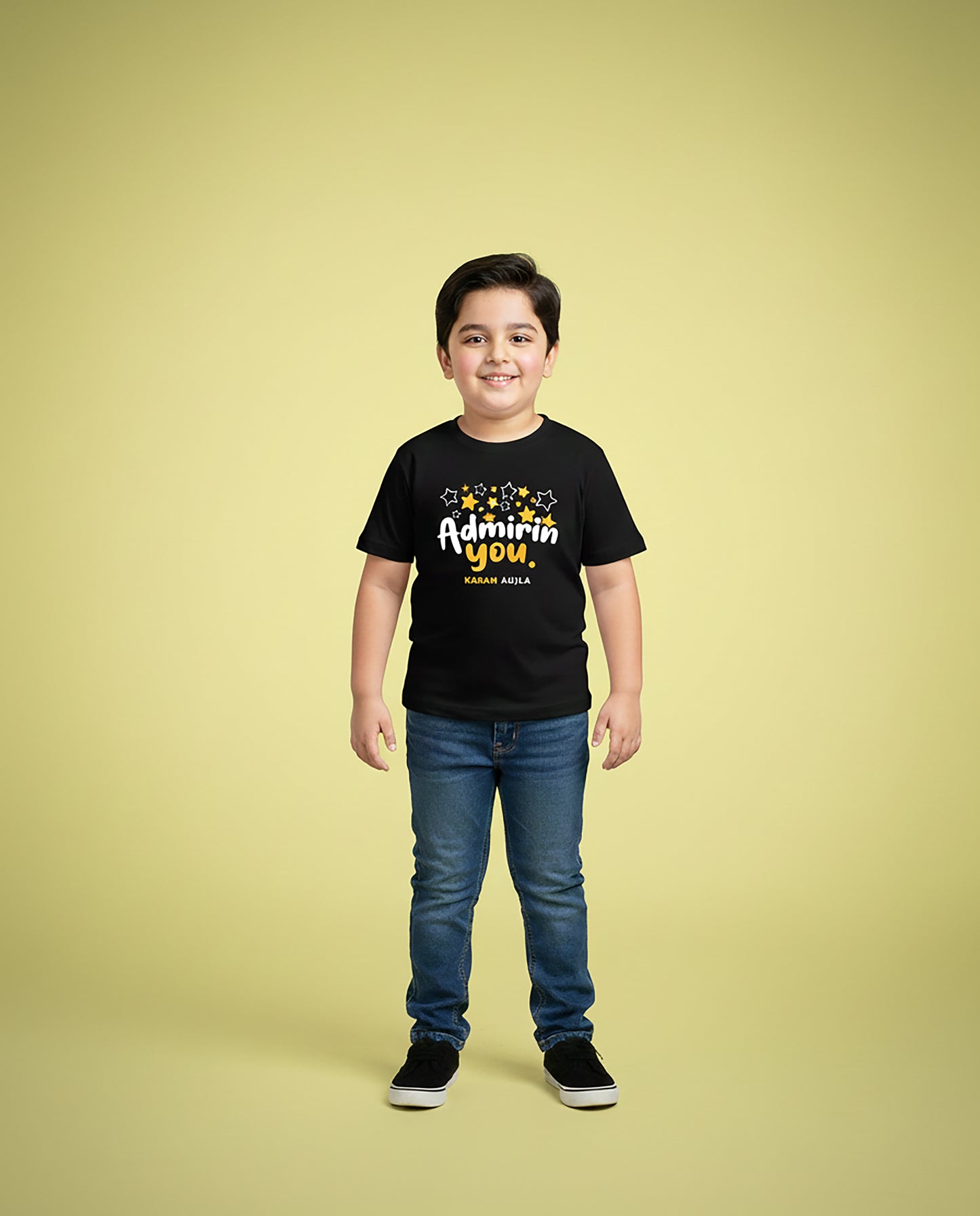 Child wearing black Admirin’ You Karan Aujla Kids T-Shirt with star print – Garrari