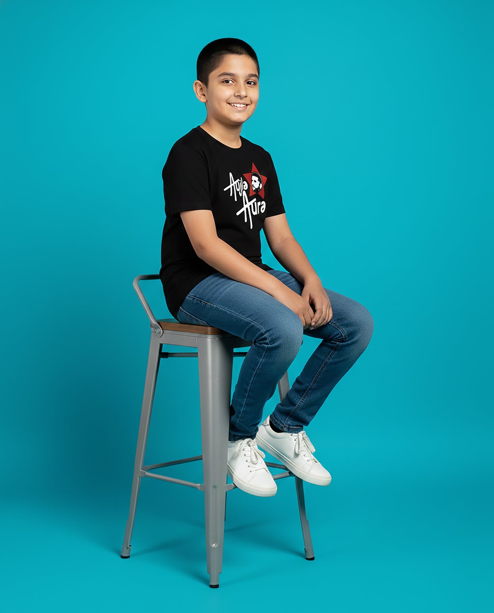 Kid wearing black Aujla Aura Karan Aujla T-Shirt with red star graphic – Garrari Kids Collection