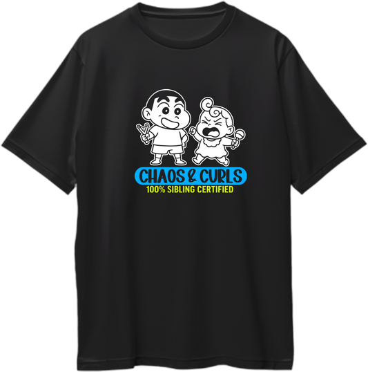 Black oversized t-shirt featuring cartoon-inspired brother and sister graphic with "Chaos & Curls – 100% Sibling Certified" text. Ideal Rakhi gift tee for siblings.
