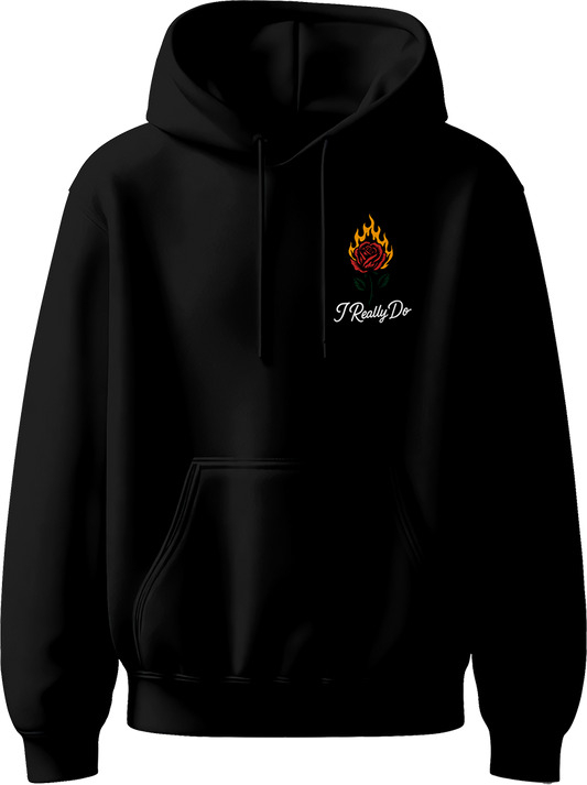 Black unisex hoodie with minimal flame-rose and ‘I Really Do’ text inspired by Karan Aujla.