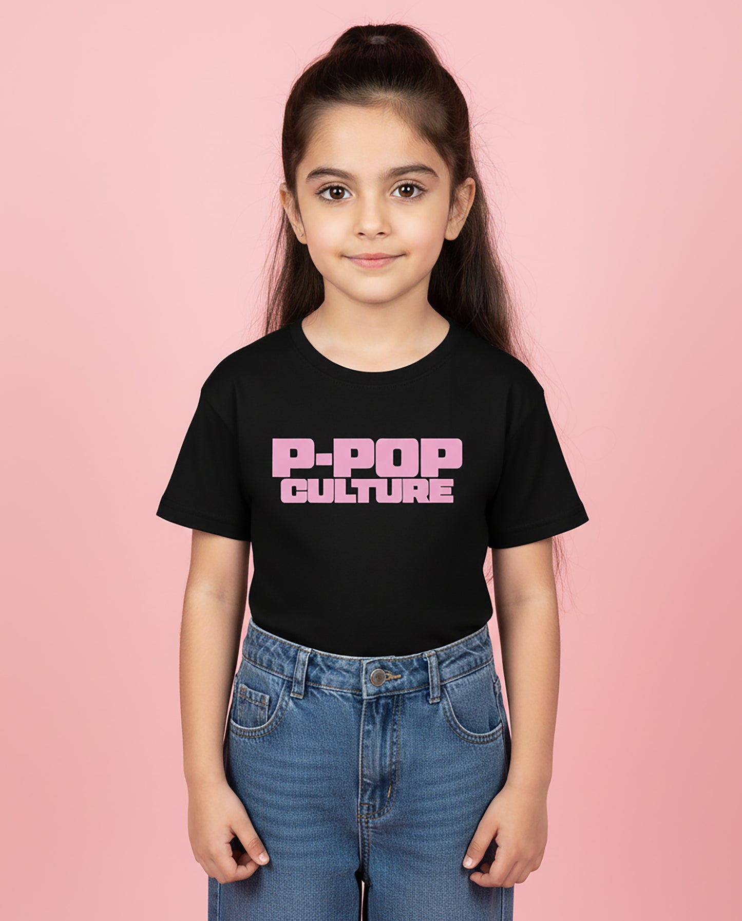 Girl wearing black P-Pop Culture Karan Aujla T-Shirt with pink block print – Garrari Kids Tee