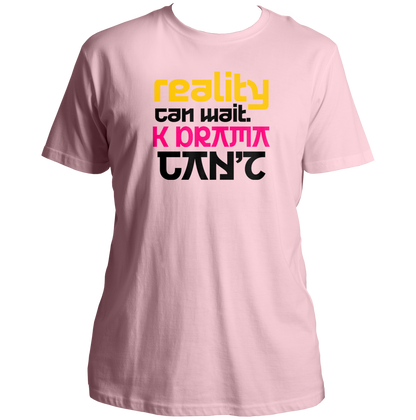 Baby Pink Reality Can Wait K-Drama Can't Unisex T-Shirt with yellow pink and black typography print