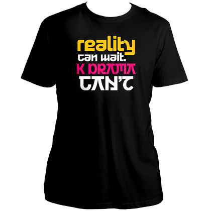 Black Reality Can Wait K-Drama Can't Unisex T-Shirt with yellow pink and white typography print
