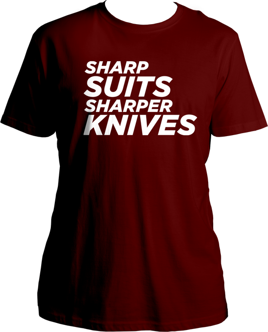 Crafted with comfort and style in mind, our Unisex Cotton Round Neck T-Shirt pays homage to the essence of The Gentlemen. Featuring a sleek design that reads "Sharp Suits Sharper Knives," this tee embodies the show's sophisticated yet edgy vibe. Made from high-quality cotton, it ensures a soft and breathable feel for all-day comfort.