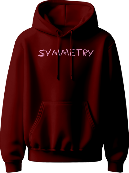 hoodie with pink “Symmetry” text inspired by Karan Aujla.